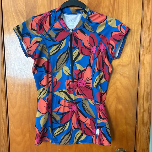 O'Neill Other - O'Neill Blue Orange Red Green Short Sleeve Swim Shirt Rash-guard Size M